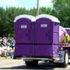 Two porta potties strapped onto the back of the porta potty pumper truck in the Pittsville Parade July 4, 2008